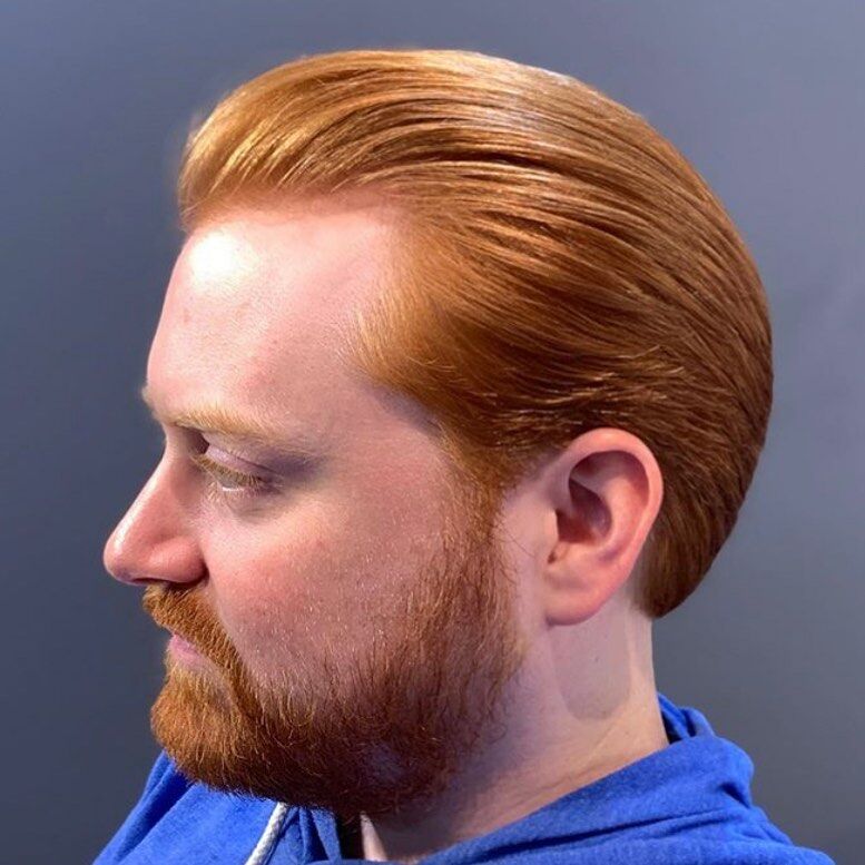 red hair brushed back pompadour