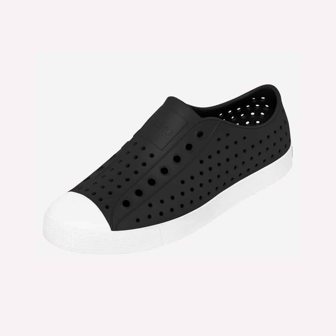 A black and white Native Jefferson slip-on shoe